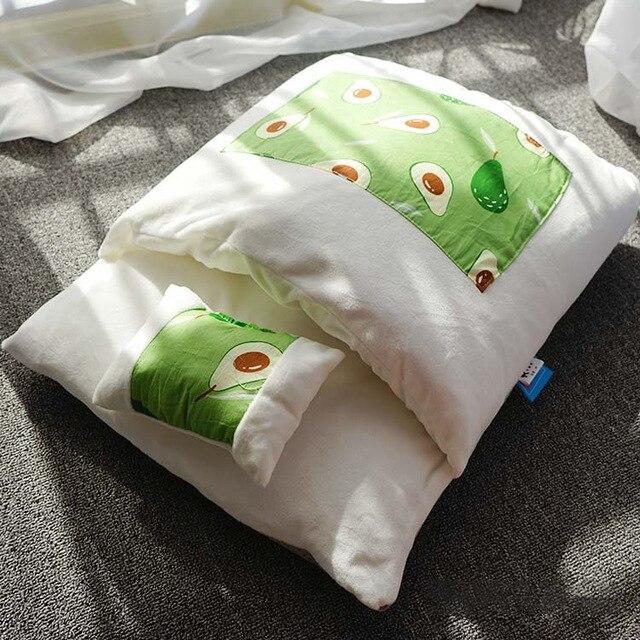 A cozy removable dog cat bed sleeping bag in soft pp cotton, perfect for winter warmth, available in multiple sizes.