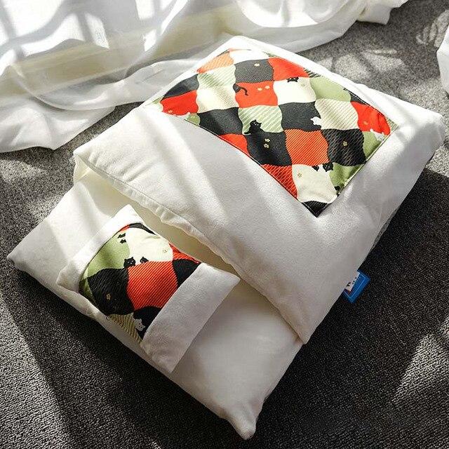 A cozy removable dog cat bed sleeping bag in soft pp cotton, perfect for winter warmth, available in multiple sizes.