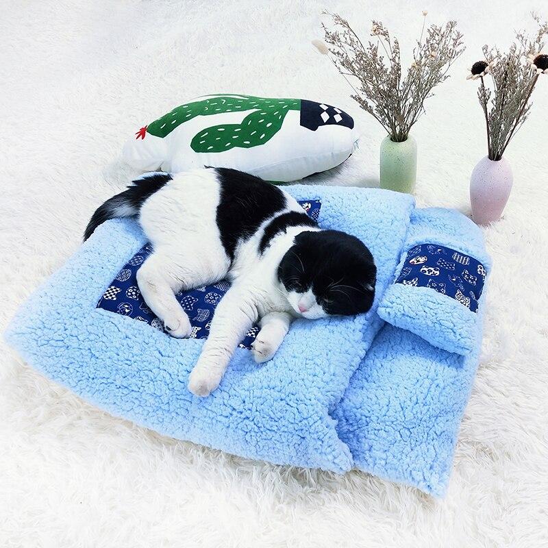A cozy removable dog cat bed sleeping bag in soft pp cotton, perfect for winter warmth, available in multiple sizes.