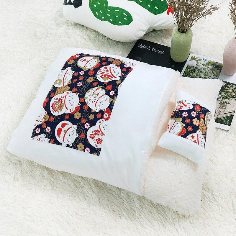 A cozy removable dog cat bed sleeping bag in soft pp cotton, perfect for winter warmth, available in multiple sizes.