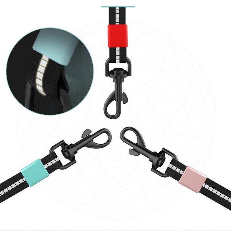 Retractable Pet Dog Leash in black, blue, and pink colors, featuring a reflective design and ergonomic handle for comfort.