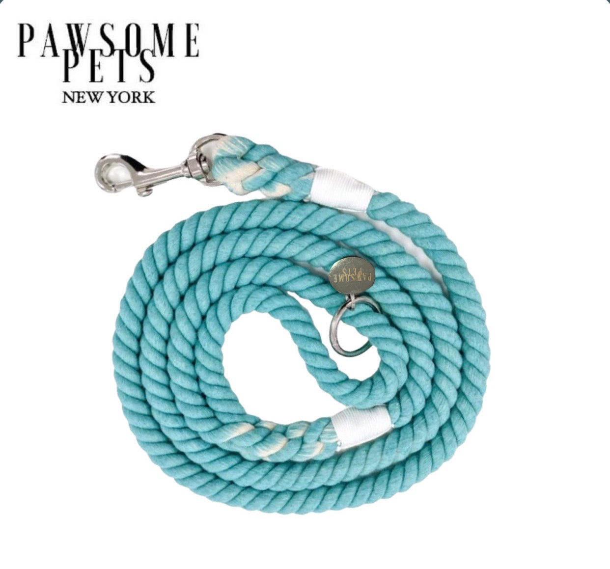 A vibrant ROPE LEASH - CANAL made from 100% cotton rope, featuring luxe hardware and a matching dog charm, perfect for stylish pet walks.