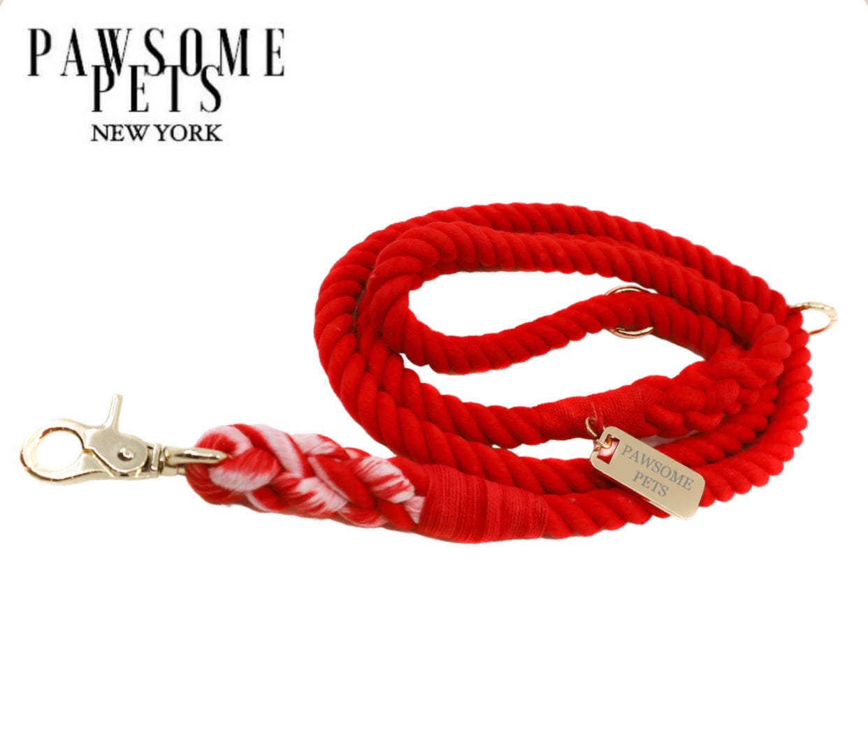 A vibrant red rose rope leash made from 100% cotton, featuring luxe hardware and a matching dog charm.