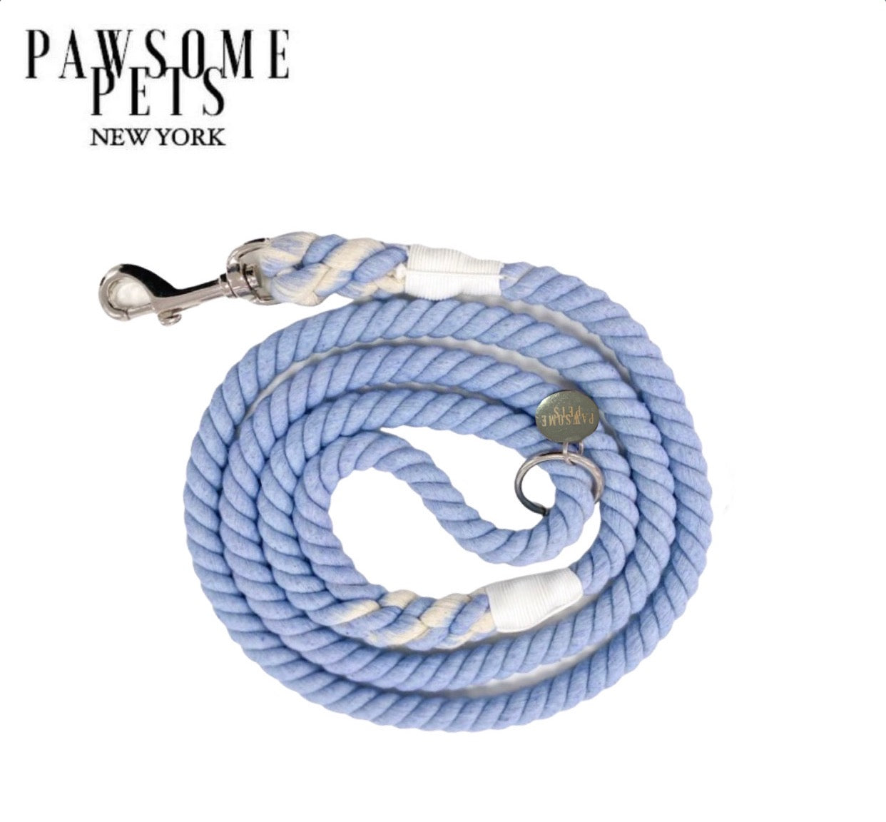 A vibrant sea blue rope leash made from durable cotton, featuring luxe hardware and a matching dog charm.