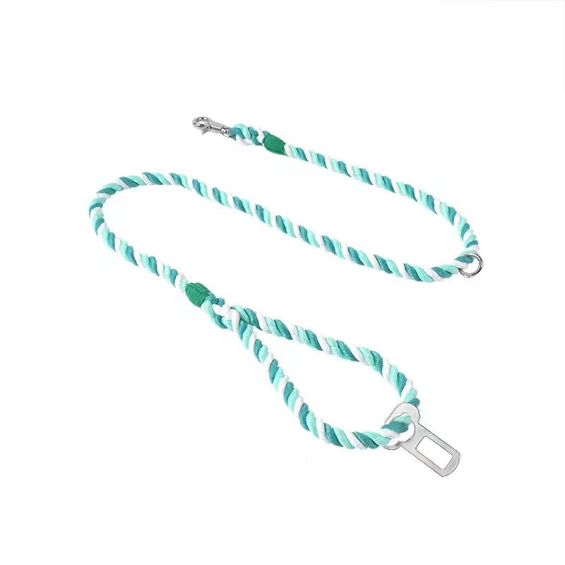 A durable Forest Love Rope Dog Safety Seat Belt made from hand woven cotton rope, featuring a brass trigger snap and adjustable strap.