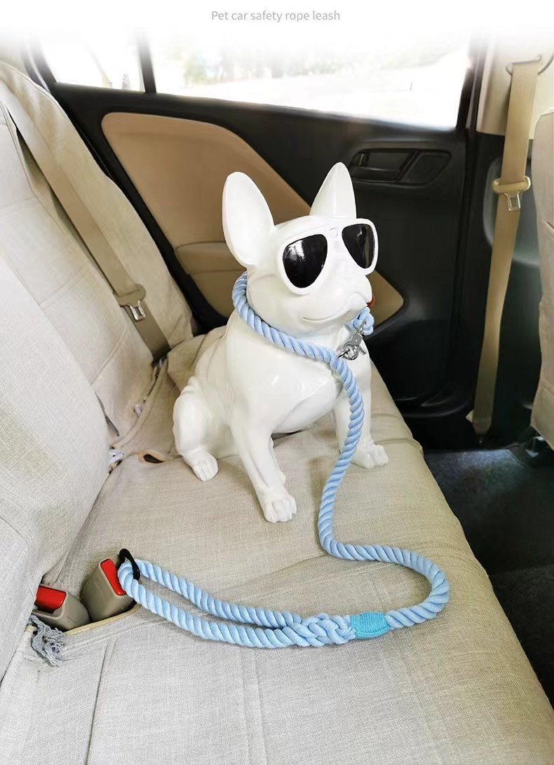 A durable Forest Love Rope Dog Safety Seat Belt made from hand woven cotton rope, featuring a brass trigger snap and adjustable strap.