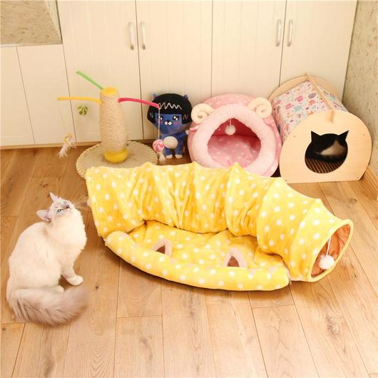 Soft Cat Tunnel with Bed Mat featuring a velvety exterior, pom-pom balls, and a removable sleeping mat.