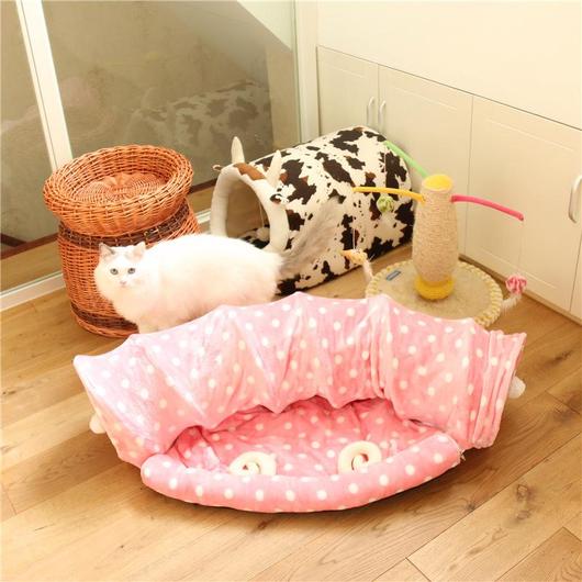 Soft Cat Tunnel with Bed Mat featuring a velvety exterior, pom-pom balls, and a removable sleeping mat.