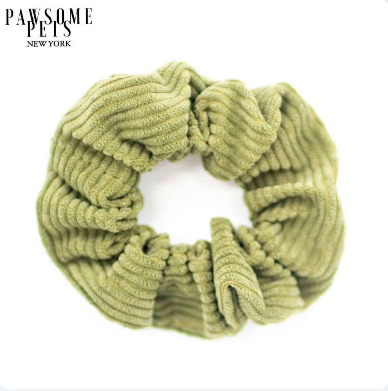 A set of stylish green cotton scrunchies, showcasing their soft texture and vibrant color, perfect for hair styling.