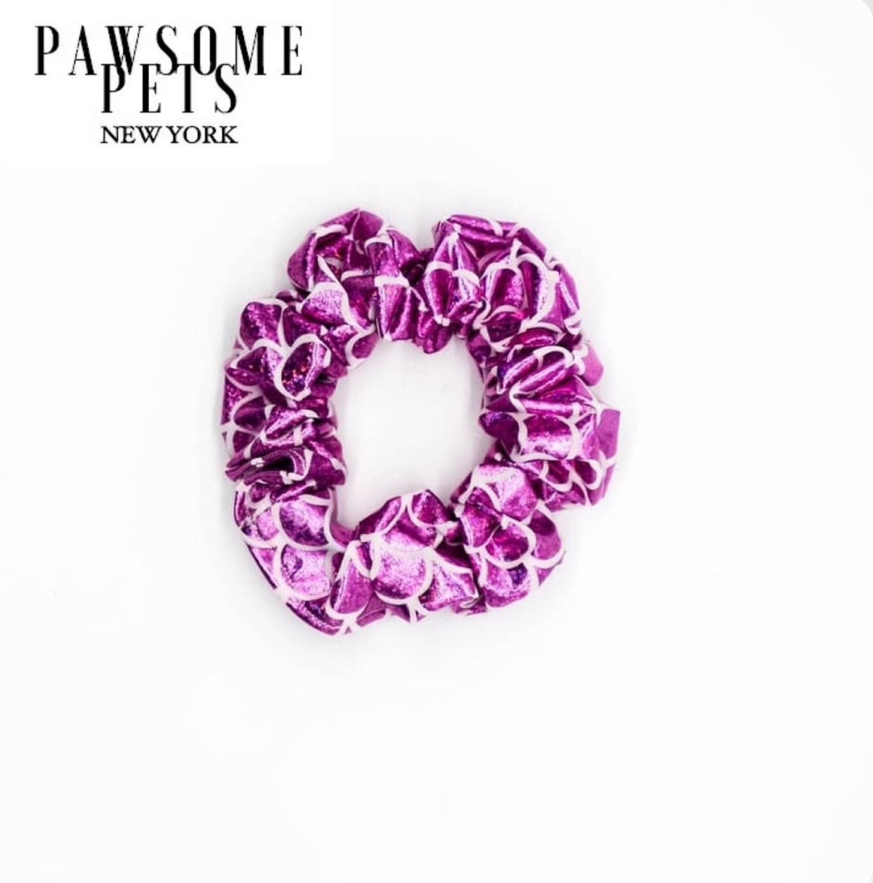 Purple Love scrunchies made from organic cotton, featuring a vibrant purple color and hand-stitched finish.