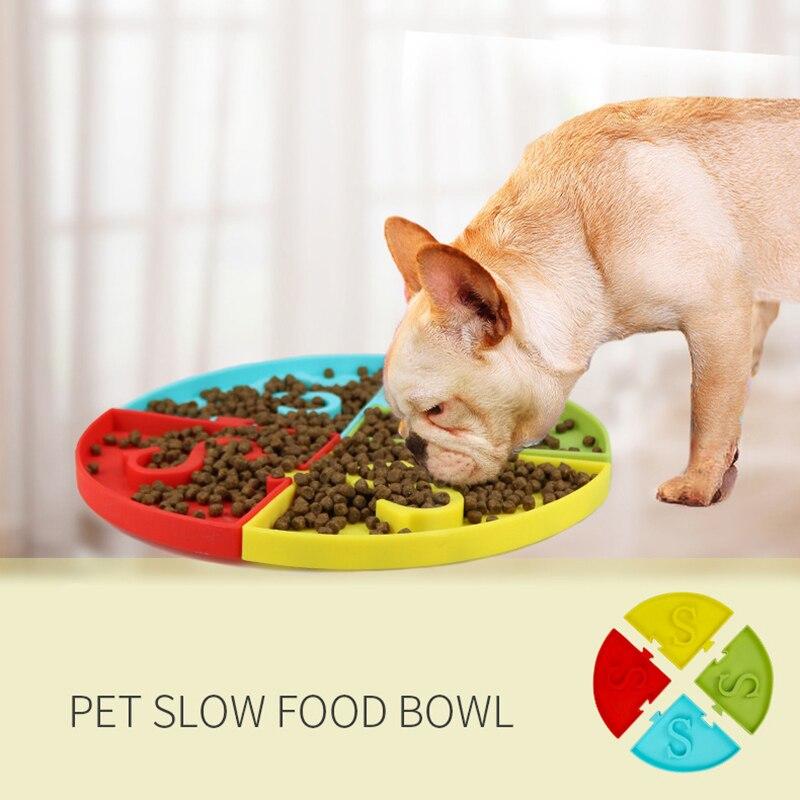 Silicone pet bowl designed for slow eating, featuring raised sections to prevent choking, suitable for dogs and cats.