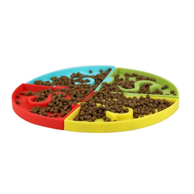Silicone pet bowl designed for slow eating, featuring raised sections to prevent choking, suitable for dogs and cats.