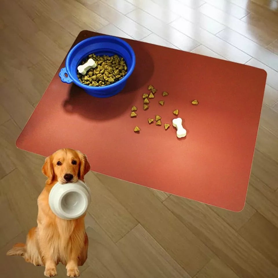 Silicone Pet Feeding Pad in a vibrant color, designed for dogs and cats, featuring a non-slip backing and waterproof surface for easy cleaning.