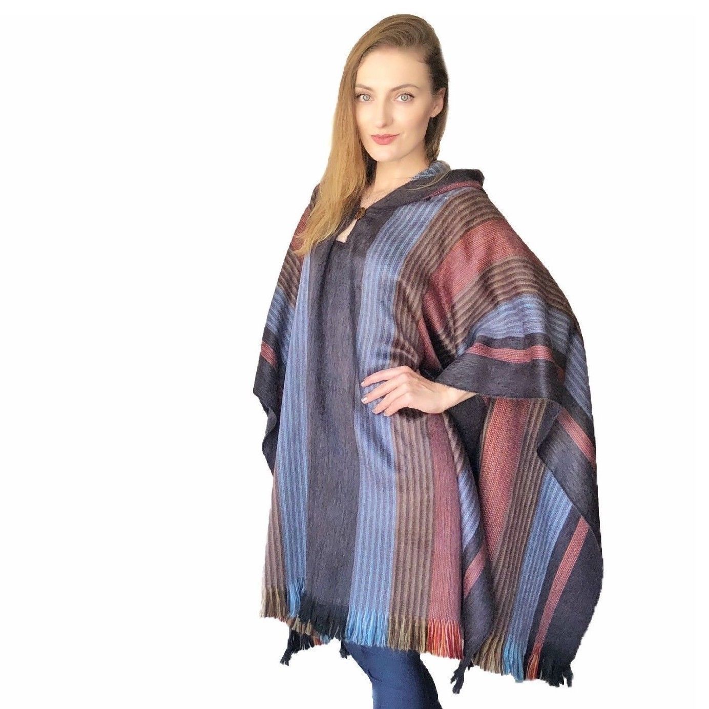 A beautifully crafted Six Band Alpaca Poncho showcasing intricate patterns of colored bands, made from 80% alpaca wool.