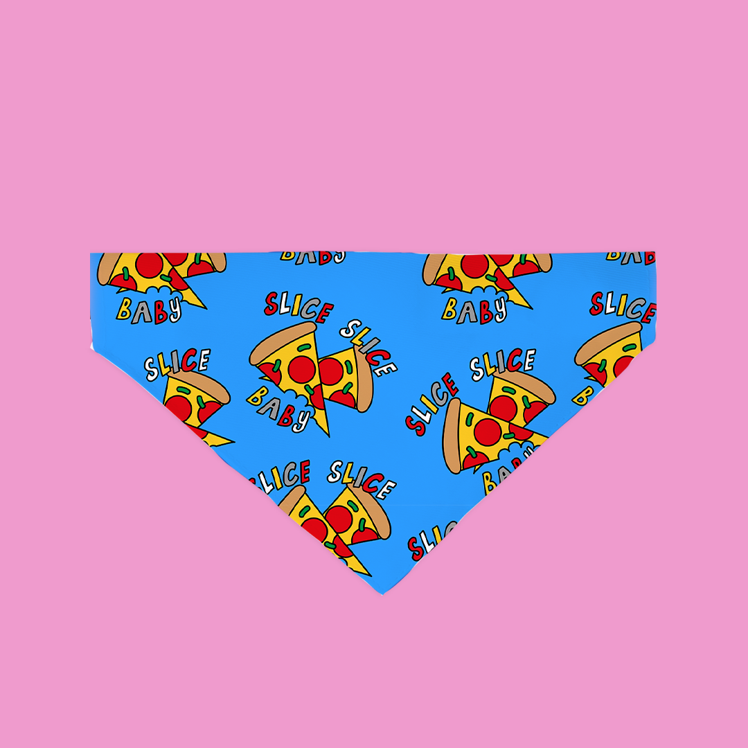 A colorful Slice Slice Baby Bandana for dogs, showcasing its unique fabric and slip-on design, perfect for stylish pets.