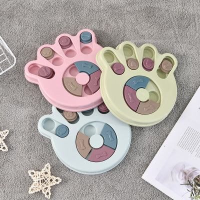 A colorful Slow Feeder Puzzles Eating Toy designed for cats, featuring a rotating top and no-slip base for interactive feeding.
