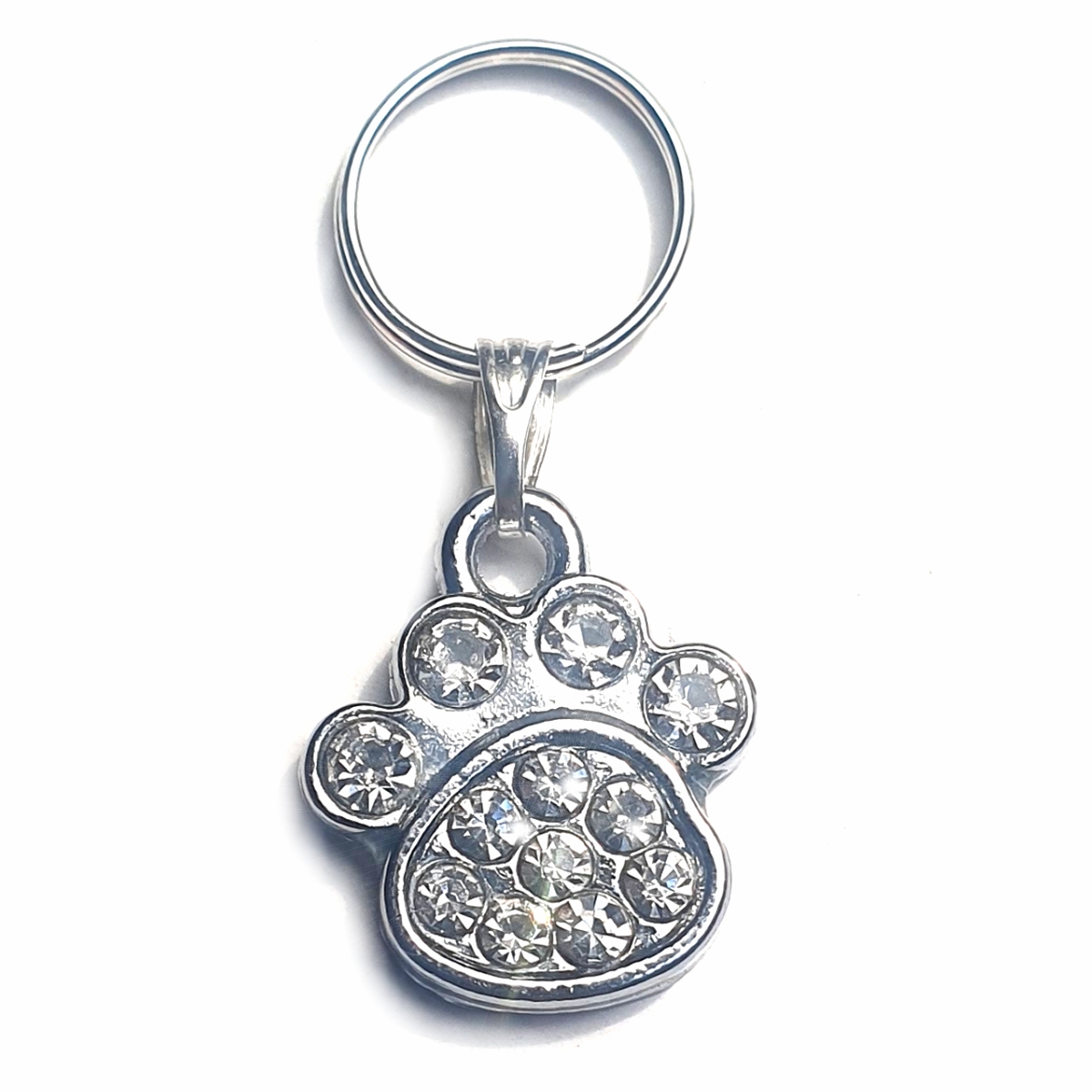 Small rhinestone paw charms for dogs and cats, featuring clear sparkling rhinestones and a lobster clasp for easy attachment.
