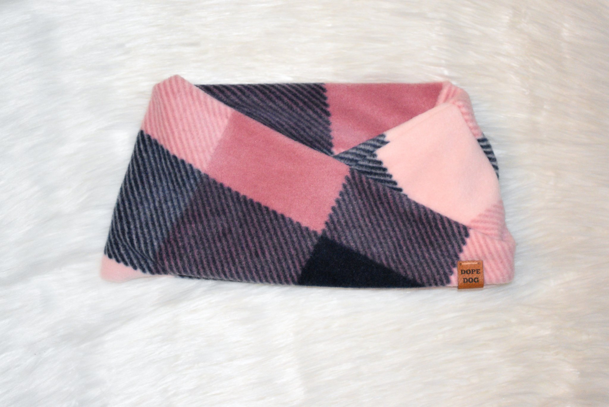 Smitten Dog Scarf in cozy faux fur, perfect for dachshunds and great danes, showcasing stylish twisted neck design.