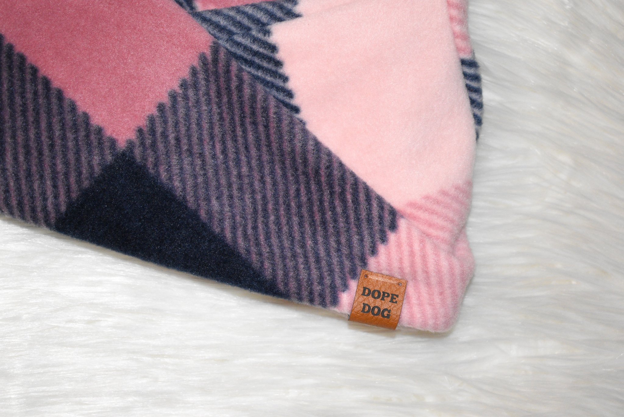 Smitten Dog Scarf in cozy faux fur, perfect for dachshunds and great danes, showcasing stylish twisted neck design.