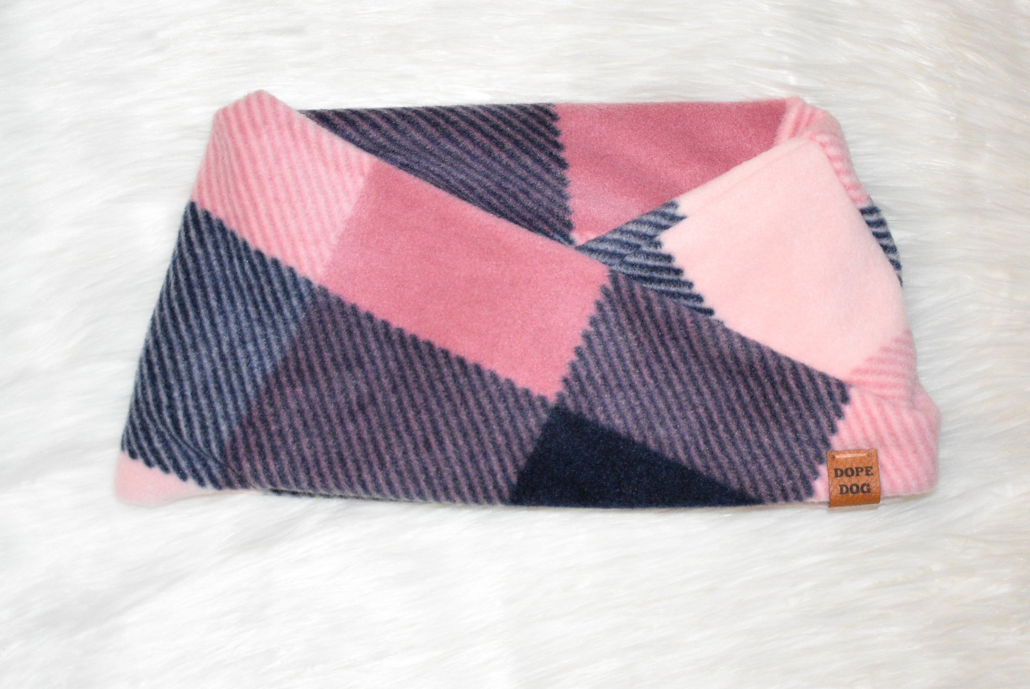 Smitten Dog Scarf in cozy faux fur, perfect for dachshunds and great danes, showcasing stylish twisted neck design.