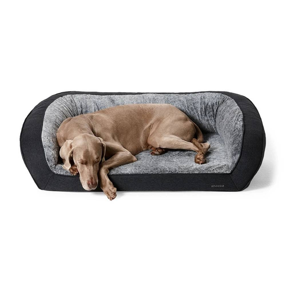 Snooza Futon Orthopaedic Dog Sofa in Chinchilla color, featuring plush bolstered walls and a comfortable foam base, perfect for dogs of all sizes.