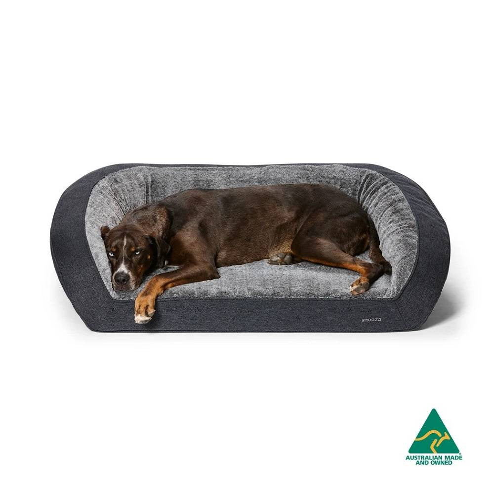 Snooza Futon Orthopaedic Dog Sofa in Chinchilla color, featuring plush bolstered walls and a comfortable foam base, perfect for dogs of all sizes.