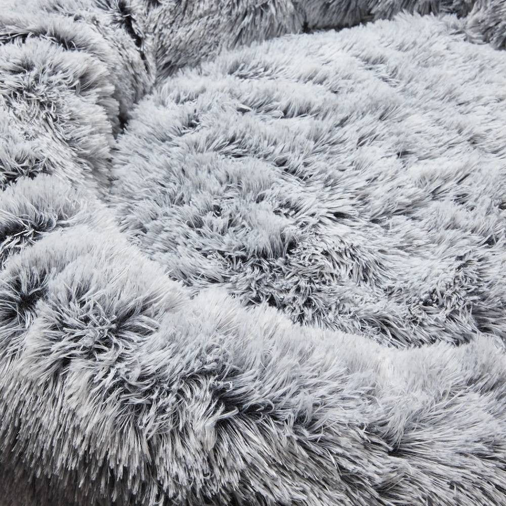 Snooza Futon Soothing & Calming Cuddler in Silver Fox, featuring soft faux fur and raised walls for pet comfort.