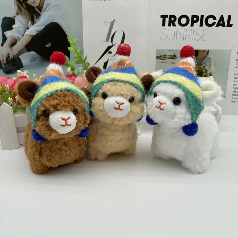 Soft cute alpaca plush doll keychain wearing a Christmas hat, perfect for festive gifts.