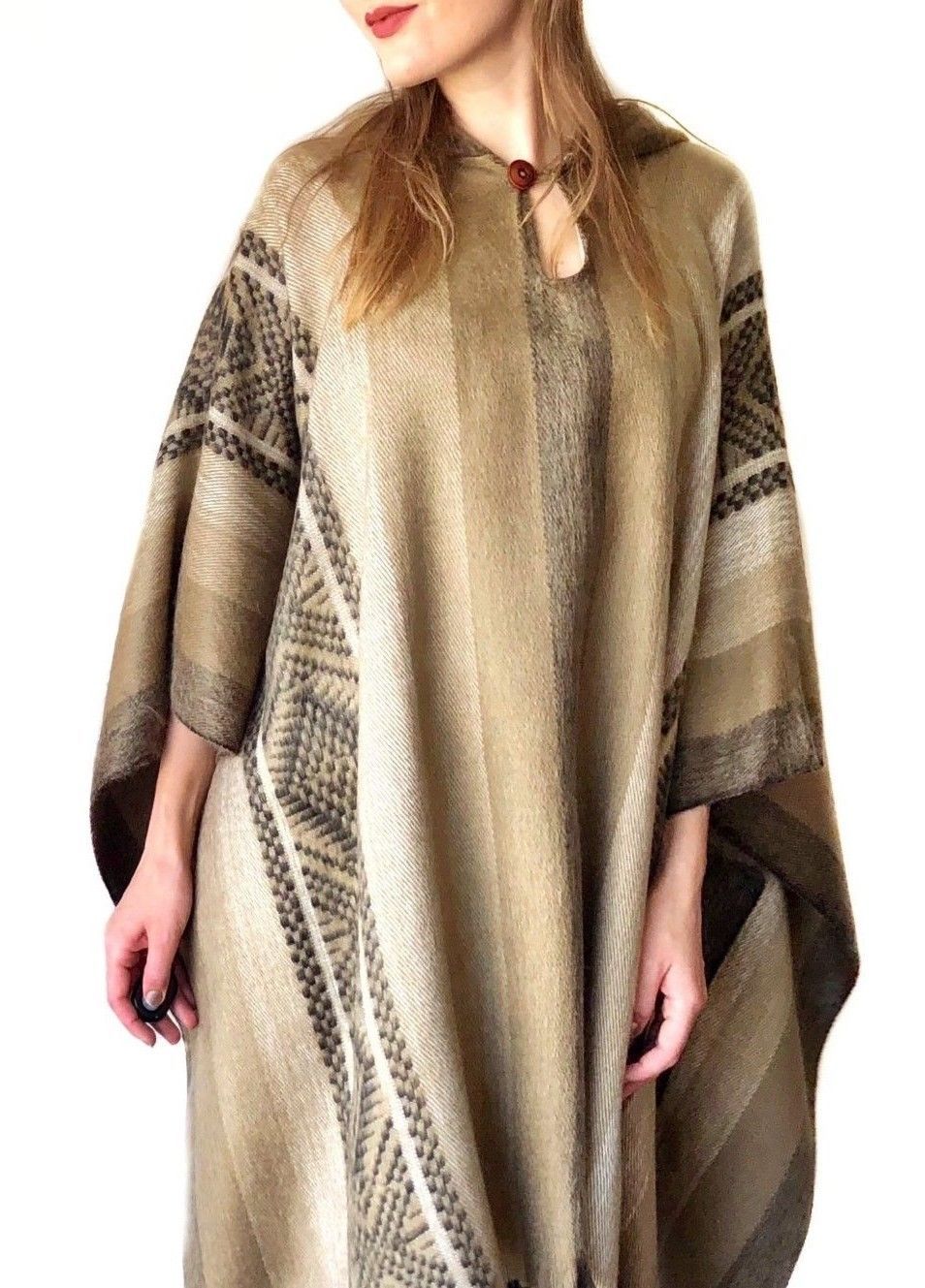 Soft Gold Incan Alpaca Poncho featuring elegant gold patterns, made from 80% alpaca wool and 20% acrylic, handcrafted in Ecuador.