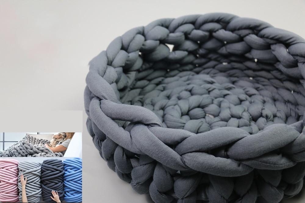 A cozy, handmade knit pet bed designed for small dogs and cats, featuring a soft, breathable fabric and a detachable design for easy washing.