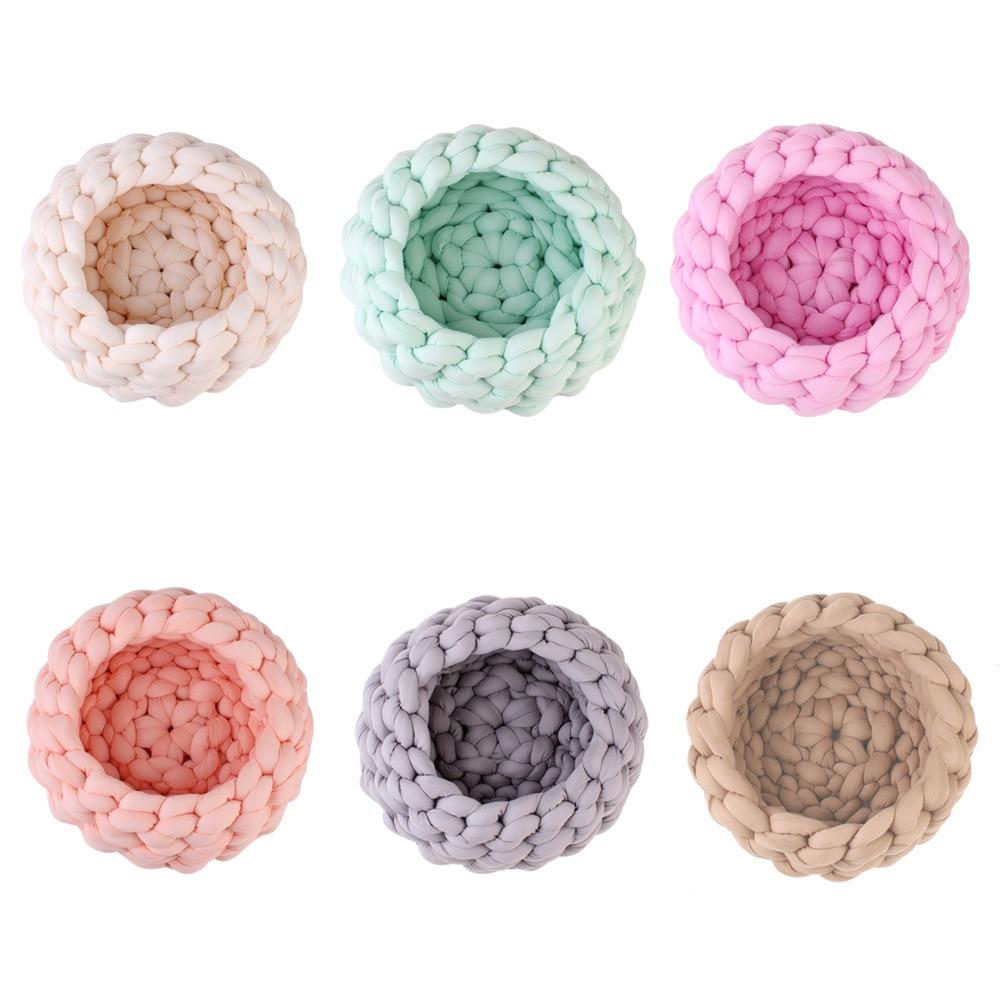 A cozy, handmade knit pet bed designed for small dogs and cats, featuring a soft, breathable fabric and a detachable design for easy washing.