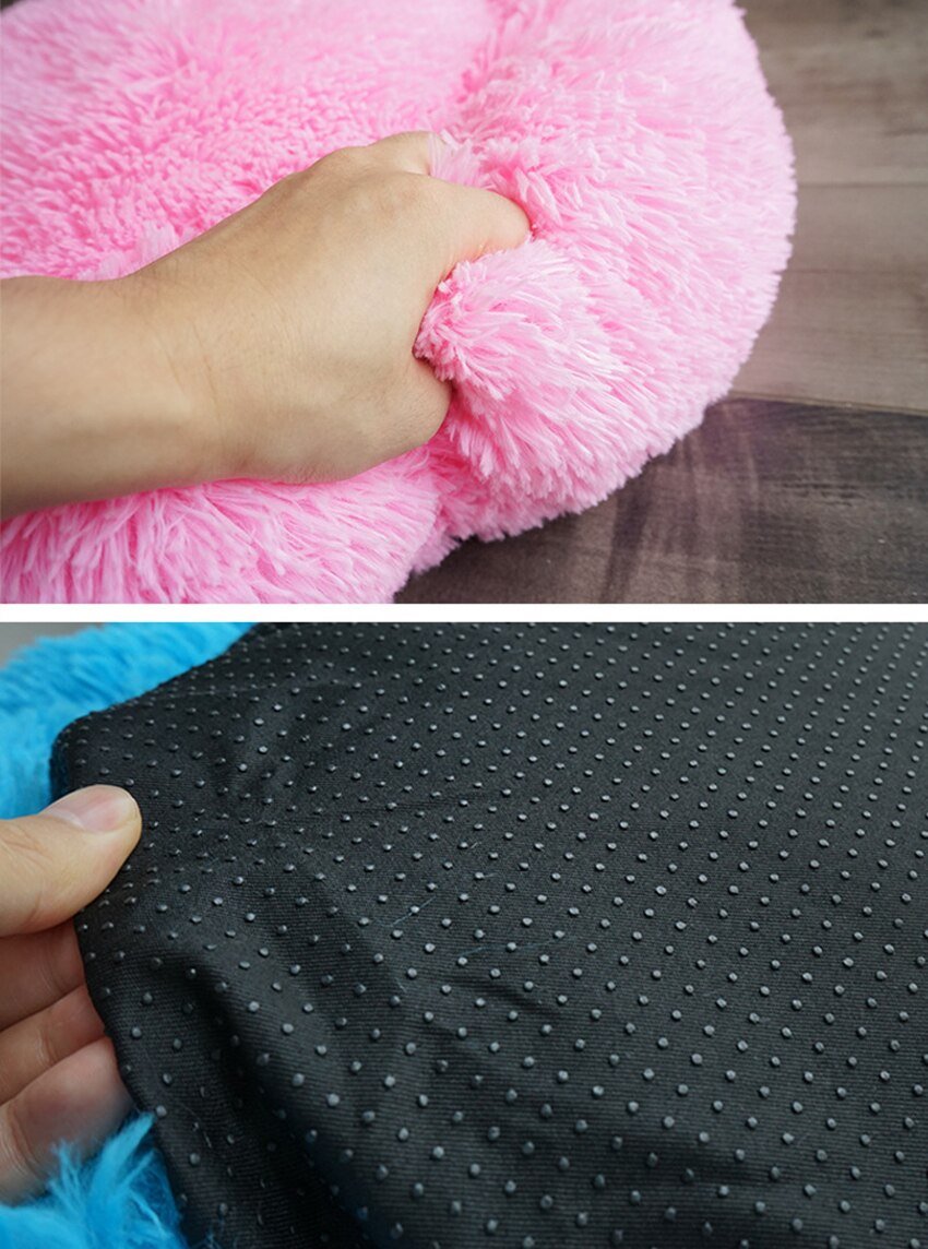 A soft, round dog bed made of plush coral fleece, designed for winter comfort, suitable for small and large dogs and cats.