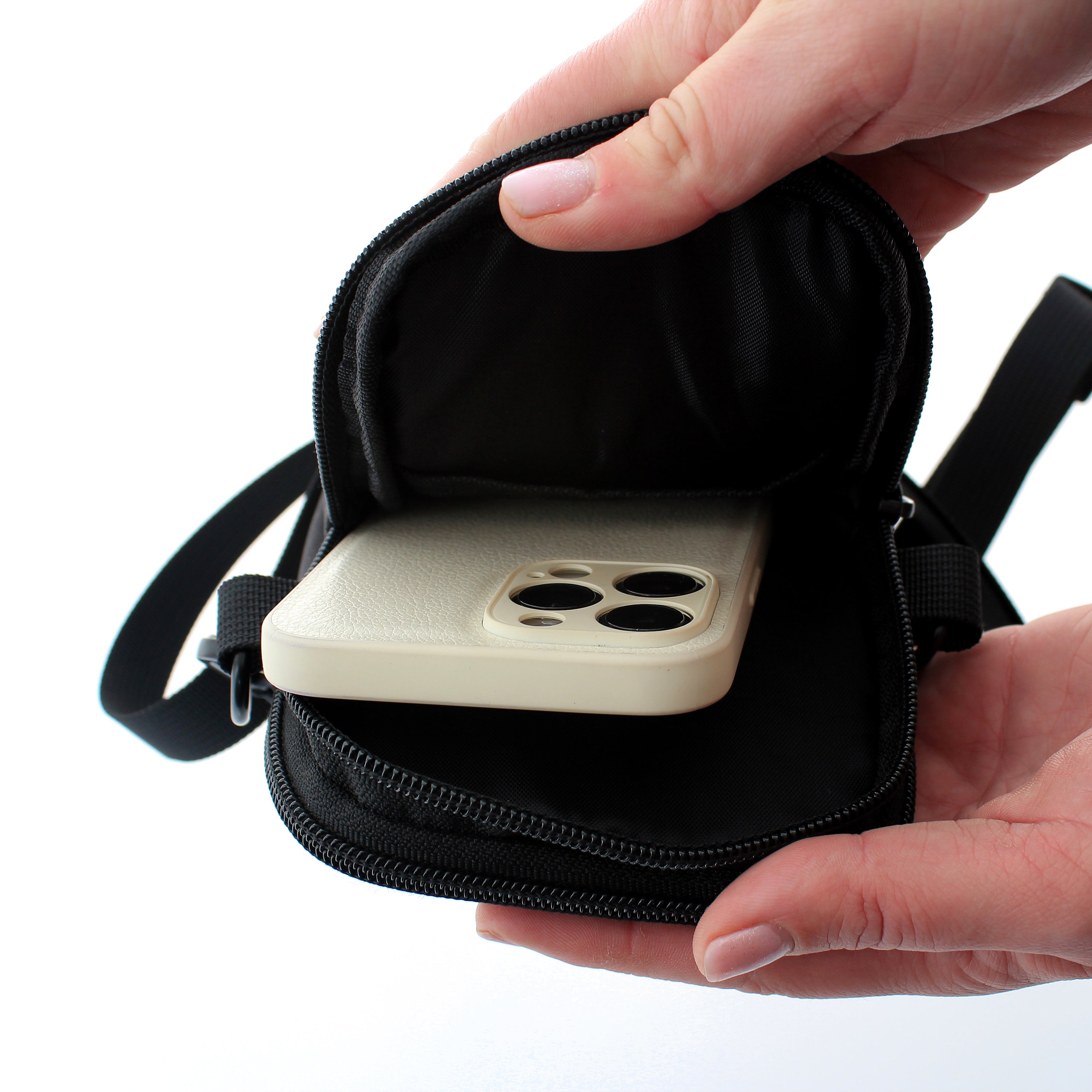 A stylish and functional lightweight dog walking bag with zipped compartments and adjustable strap, perfect for dog owners.