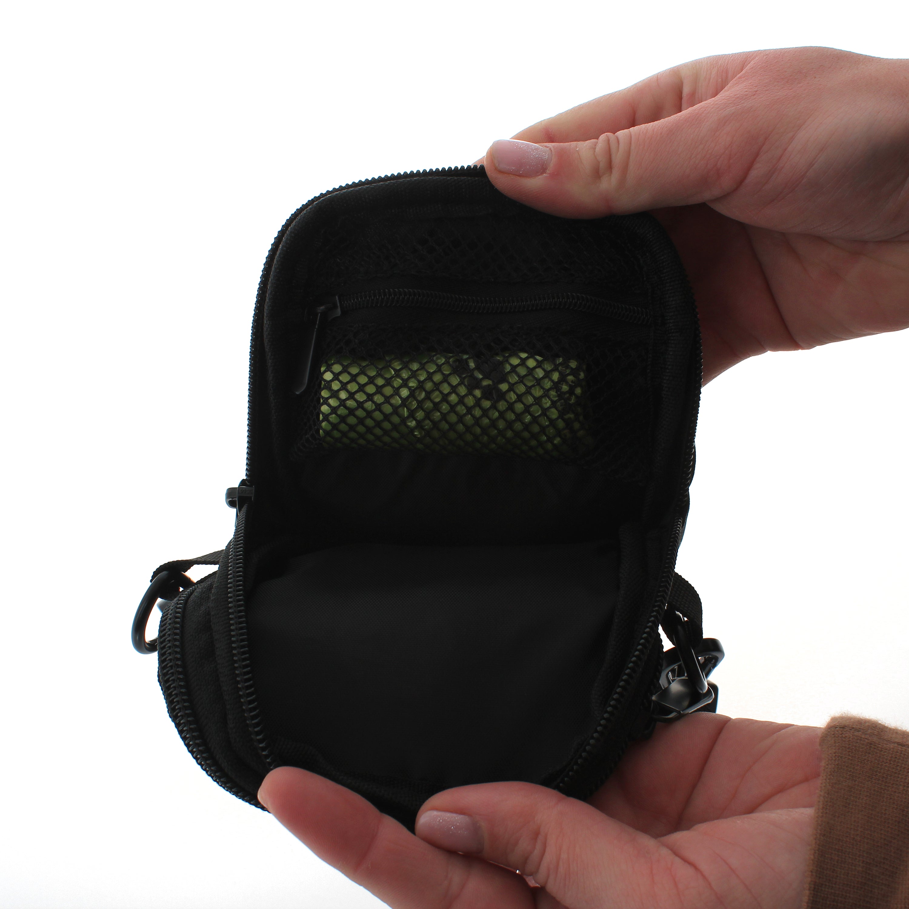 A stylish and functional lightweight dog walking bag with zipped compartments and adjustable strap, perfect for dog owners.