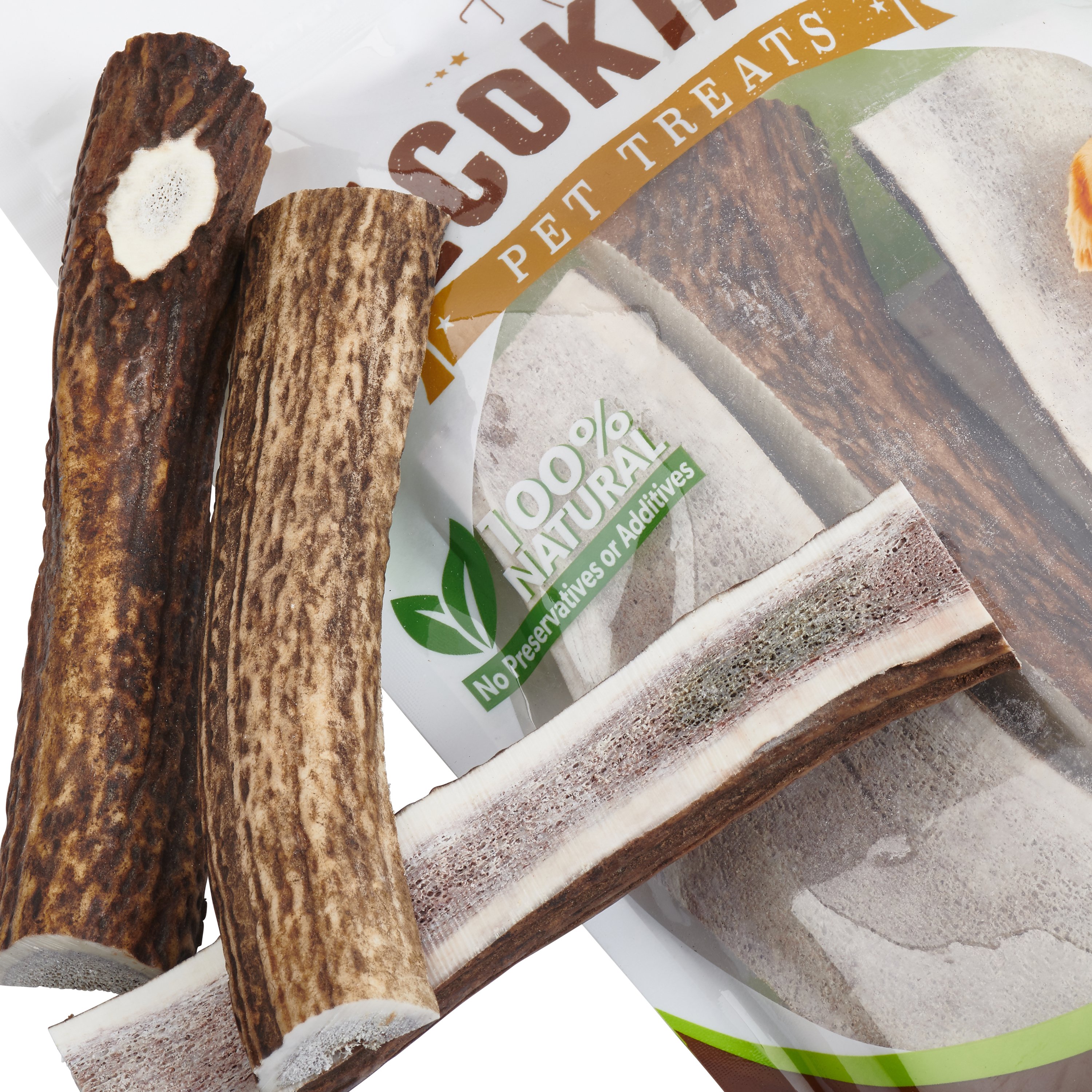 A selection of split elk antler dog chews, showcasing their natural texture and color, perfect for strong chewers.