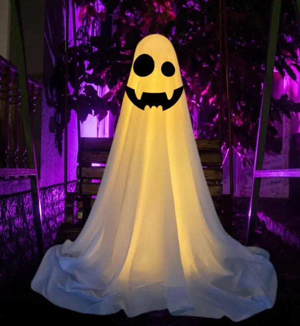 Spooky Specter Décor featuring ghostly figures swaying in the wind, perfect for Halloween decorations.