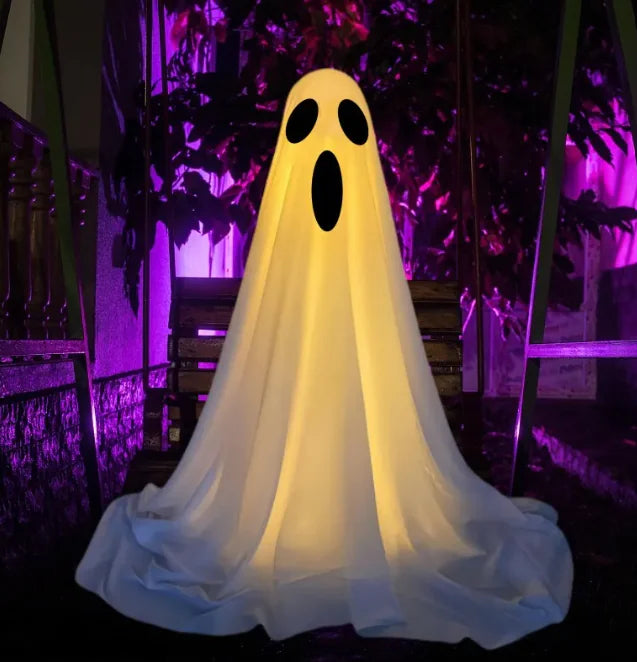 Spooky Specter Décor featuring ghostly figures swaying in the wind, perfect for Halloween decorations.