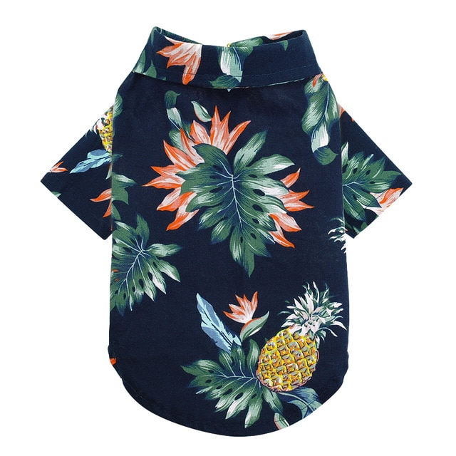 Hawaiian-themed dog shirt with pineapples