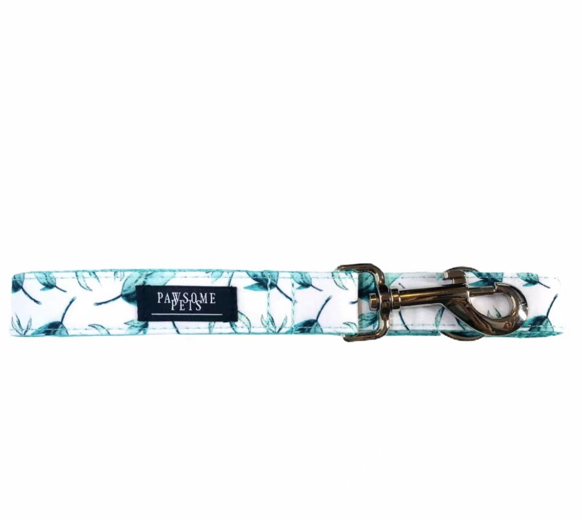 Two pieces of mint leaf patterned pet harnesses, showcasing durable construction and stylish design.