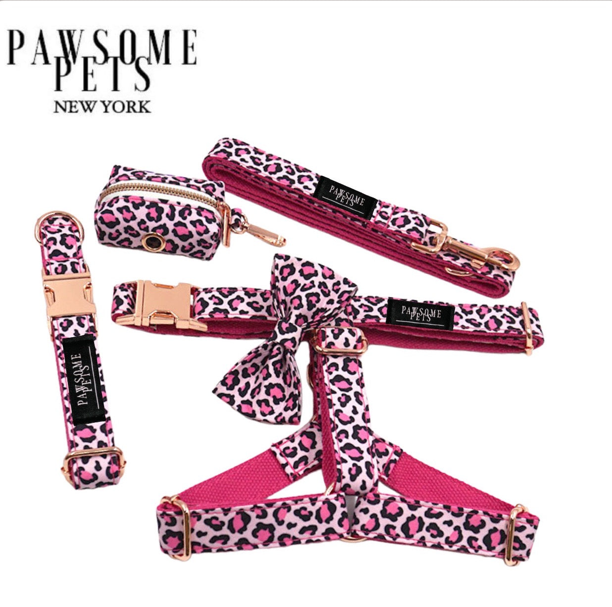 Pawsome Pets New York Step In Bundle featuring a pink leopard design, including a harness, collar, leash, bowtie, and waste bag holder.