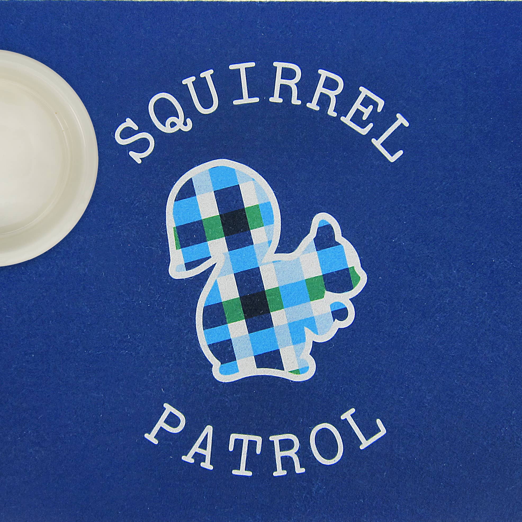 Summer Plaid Dog Mat in blue featuring a playful squirrel design, perfect for food and water bowls.