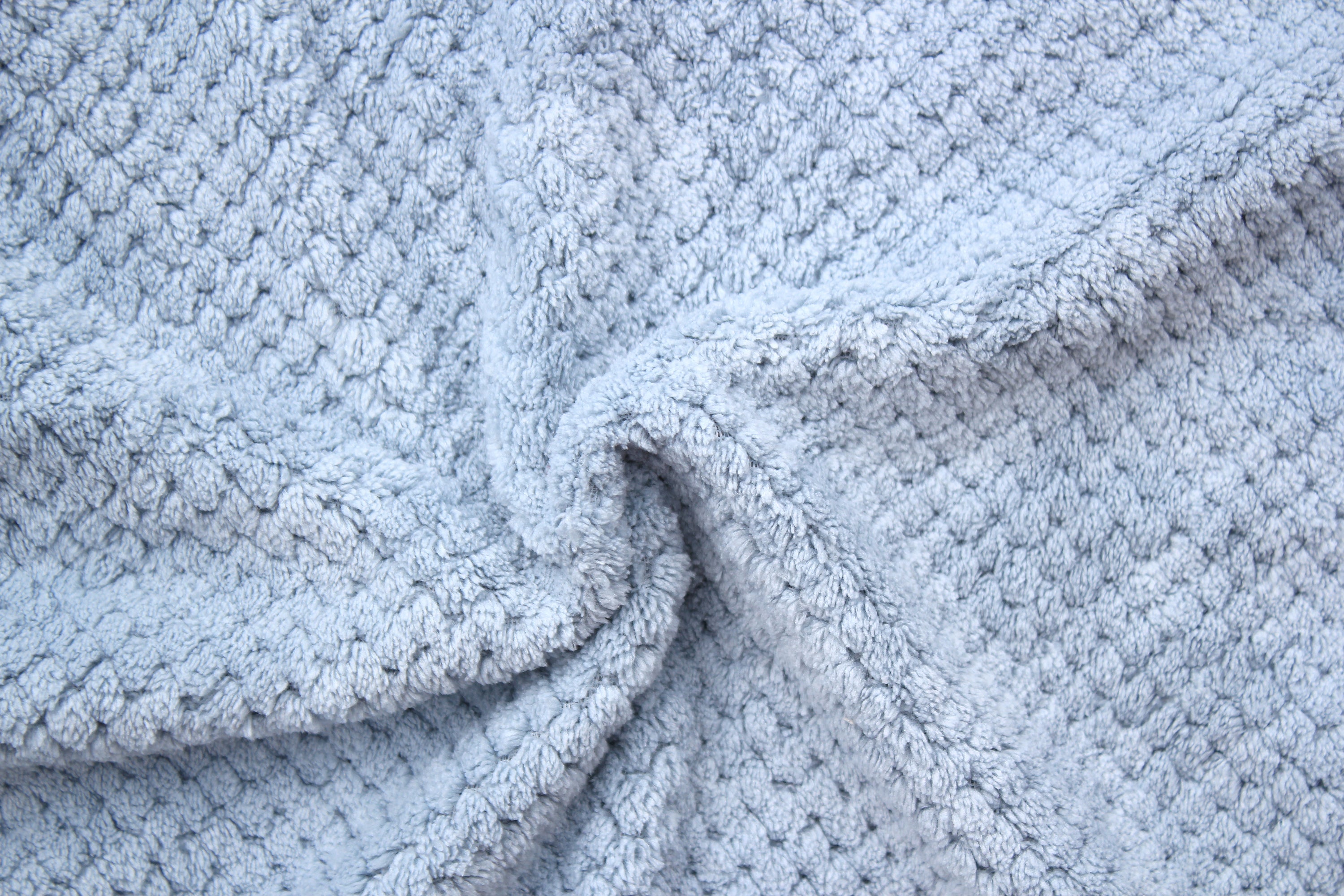 Super Absorbent Microfibre Dog Drying Bag in sky blue, designed to keep pets dry and comfortable after outdoor activities.