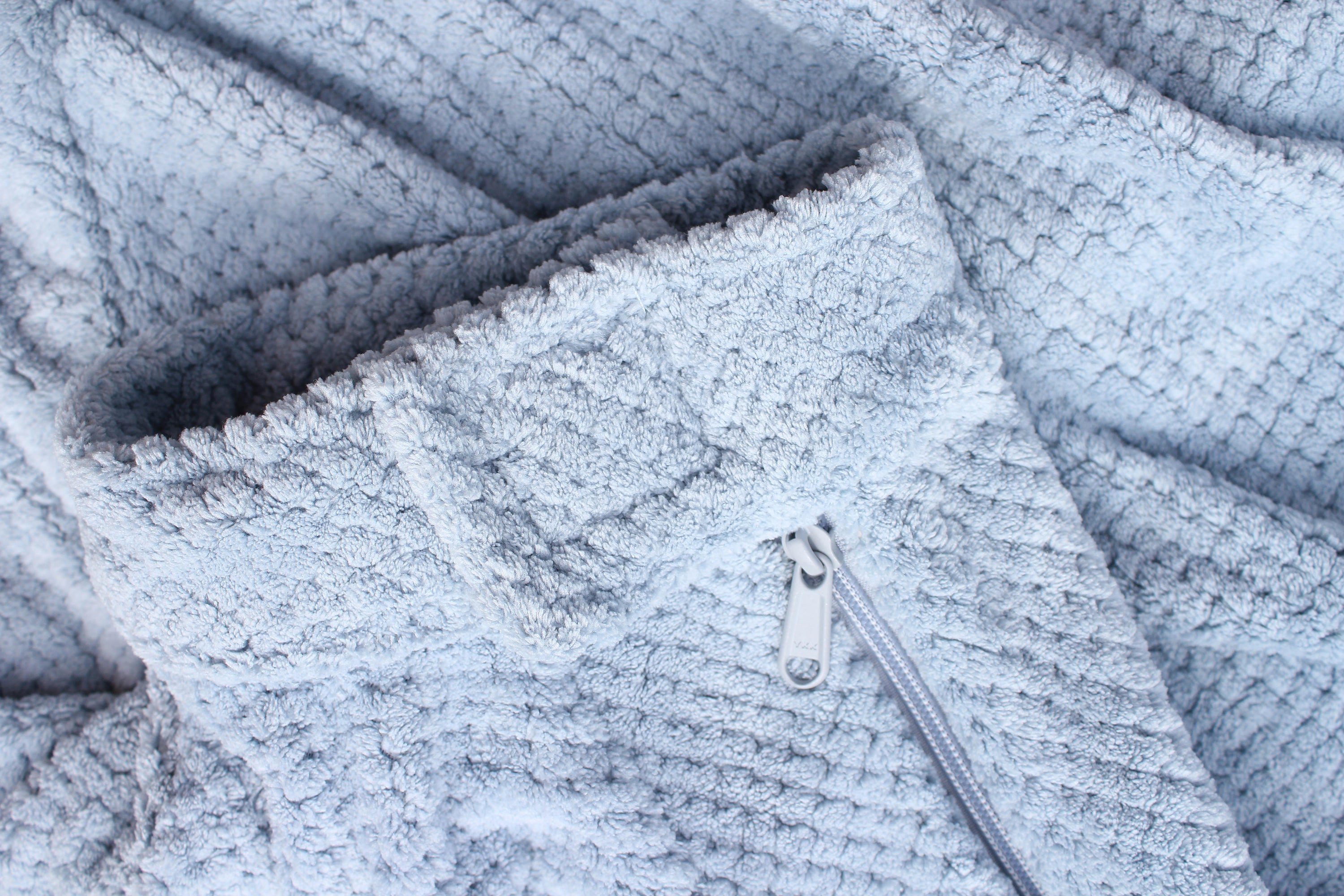 Super Absorbent Microfibre Dog Drying Bag in sky blue, designed to keep pets dry and comfortable after outdoor activities.