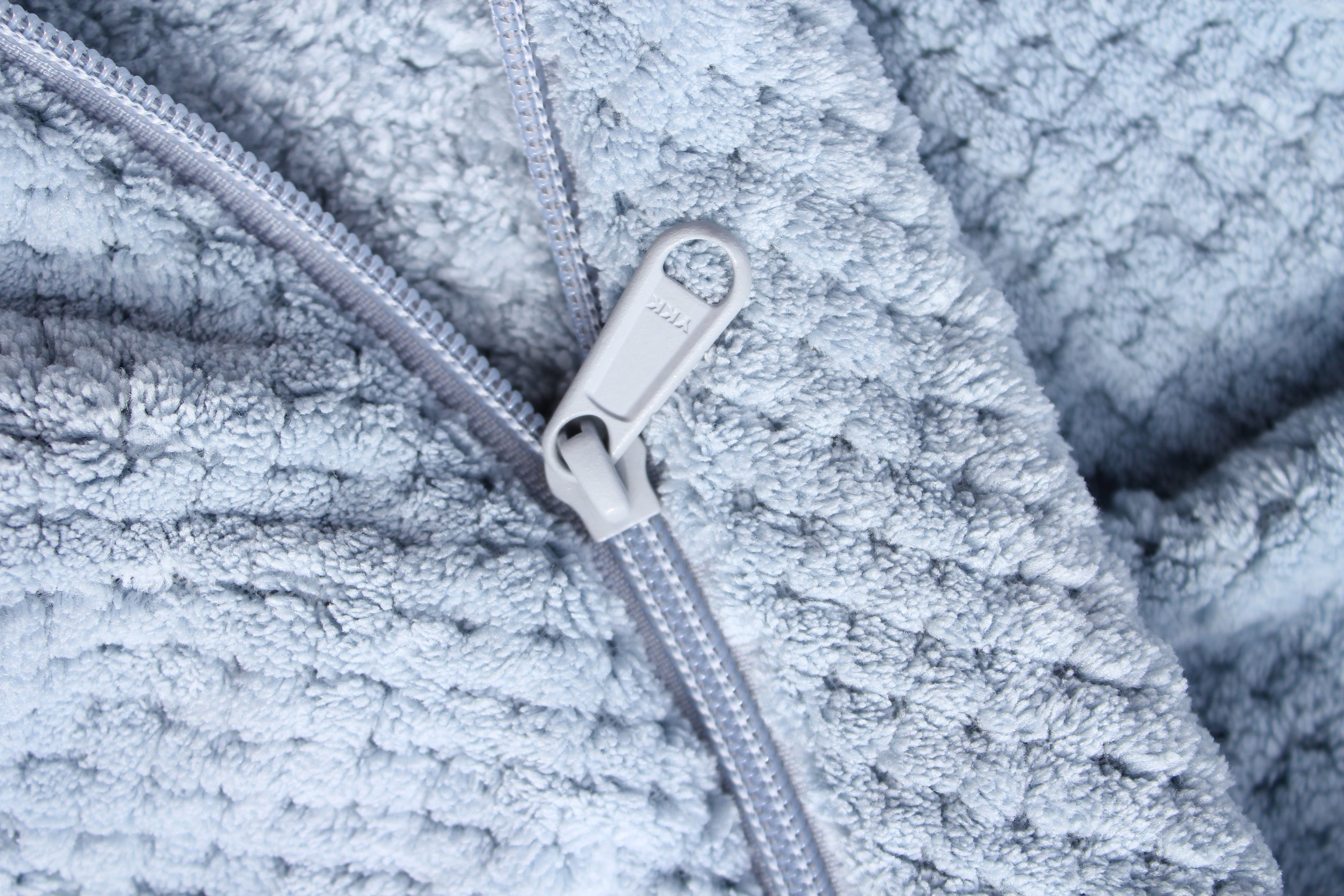 Super Absorbent Microfibre Dog Drying Bag in sky blue, designed to keep pets dry and comfortable after outdoor activities.