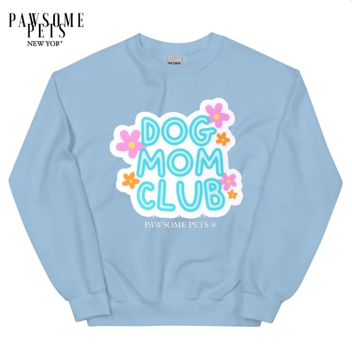 A cozy unisex sweatshirt featuring the text 'Dog Mom Club' printed in eco-friendly ink, perfect for dog lovers.