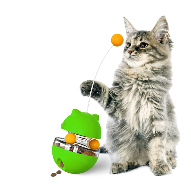 Tabby Tumbler™ interactive treat dispensing cat toy with colorful balls and flexible antenna.