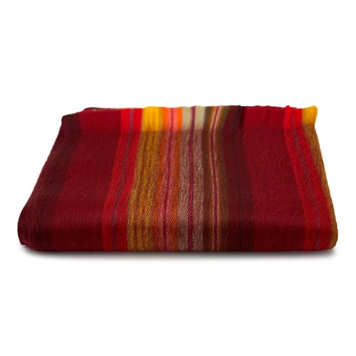 A luxurious Timeless Accent Alpaca Shawl in rich colors, showcasing its soft texture and elegant design.