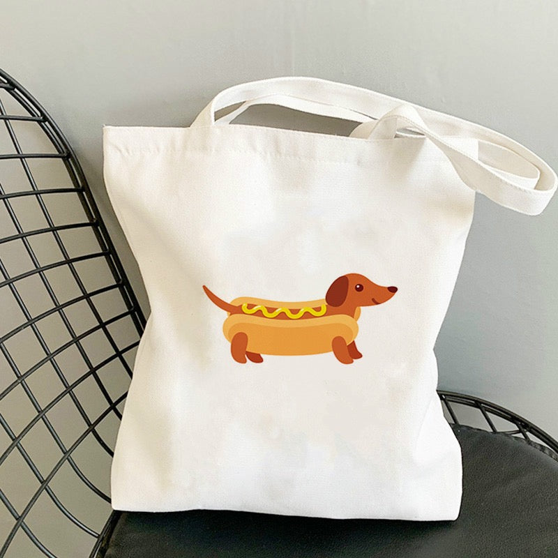 Durable Polyester Canvas Tote Bag designed by PAWSOME PETS NEW YORK, featuring vibrant artwork and spacious dimensions.