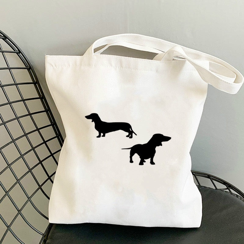 A stylish Polyester Canvas Tote Bag - #23 featuring a unique design by PAWSOME PETS NEW YORK, measuring 38*35 cm.