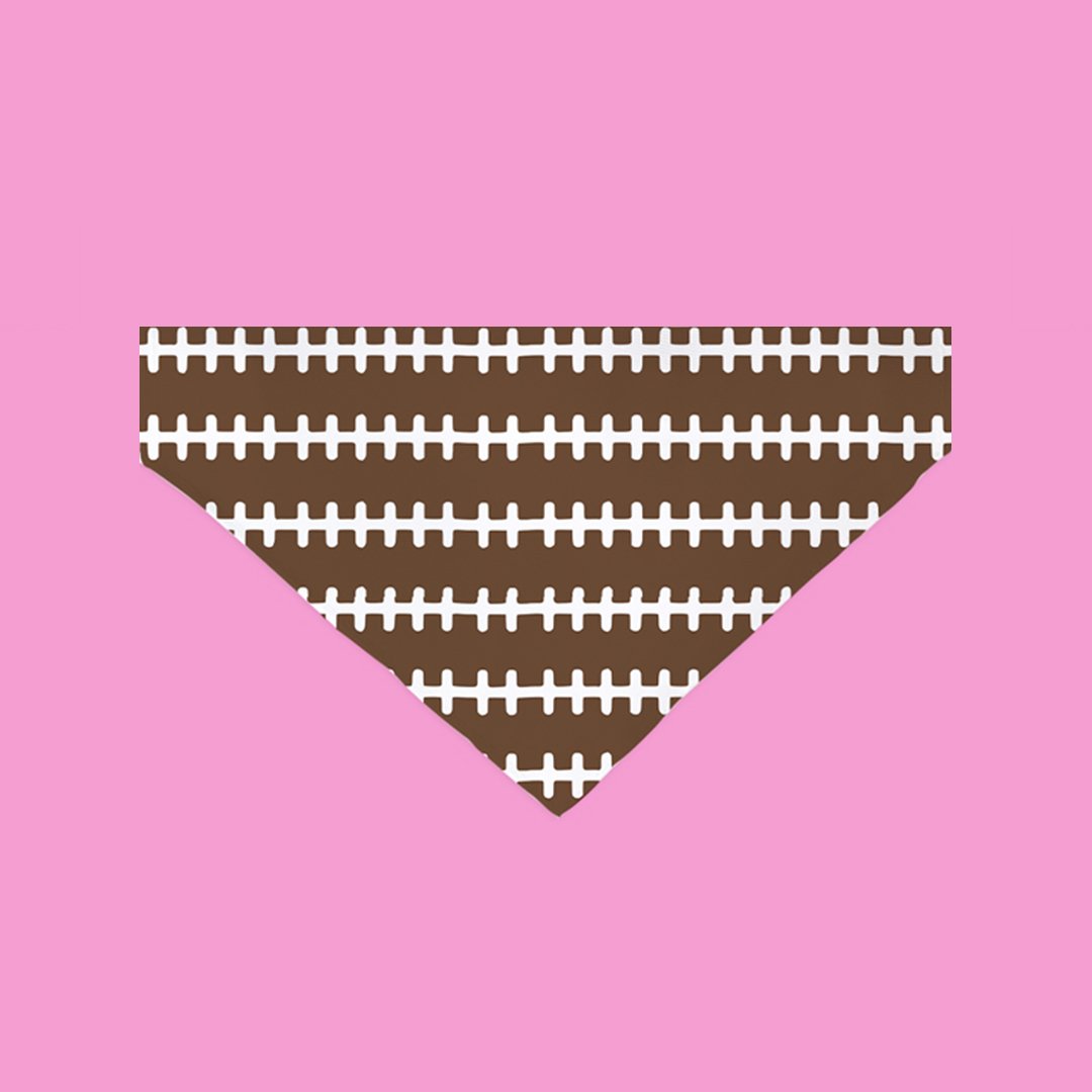 A stylish Touchdown Bandana for dogs, made of polyester fabric, featuring a unique design, perfect for birthday celebrations.